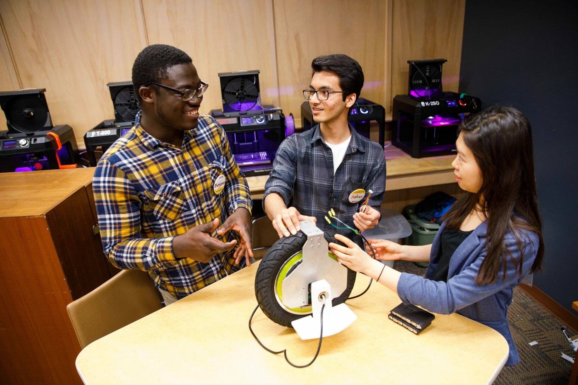 students discussing a research project